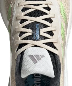 Adidas Women's Supernova Stride Move for the Planet Shoes Crystal Sand/Green Spark/Preloved Fig