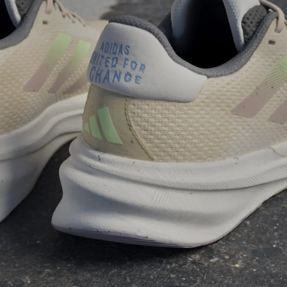 Adidas Women's Supernova Stride Move for the Planet Shoes Crystal Sand/Green Spark/Preloved Fig