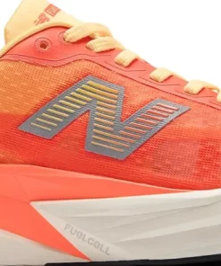 New Balance Women's Fuelcell Rebel V5 Tangerine Heat